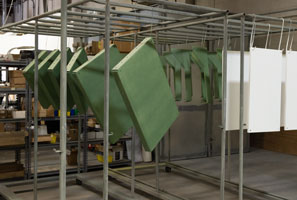 Drying racks with NEMA enclsoures just outside our in-house spray booth